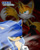 Size: 800x996 | Tagged: semi-grimdark, artist:silveralchemist09, miles "tails" prower, sonic the hedgehog, fox, hedgehog, fanfic:lost memories, abstract background, angry, black gloves, bleeding, blood, blue eyes, blue fur, clenched teeth, crying, evil, evil tails, frown, gloves, looking down, looking offscreen, messy hair, peach arms, peach fur, red bands, sad, tears, white fur, white gloves, yellow fur