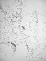 Size: 900x1200 | Tagged: safe, artist:soggycereal, miles "tails" prower, sonic the hedgehog, duo, flying, gender swap, hair over one eye, looking at each other, pencilwork, pointing, ponytail, spinning tails