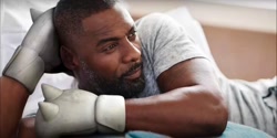 Size: 1400x700 | Tagged: safe, human, sonic the hedgehog 2 (2022), idris elba, knuckle fists, photo, solo, voice actor joke