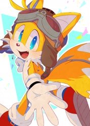 Size: 1110x1560 | Tagged: safe, artist:misuta710, miles "tails" prower, abstract background, blushing, confetti, goggles on head, hand-out, looking at viewer, mouth open, one fang, pilot hat, running, signature, solo