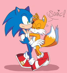 Size: 1000x1080 | Tagged: safe, artist:emilywiccan, miles "tails" prower, sonic the hedgehog, blushing, cute, dialogue, duo, english text, eyes closed, gay, heart, hugging, pink background, shadow (lighting), shipping, simple background, smile, sonic x tails, standing, surprise hug, tailabetes