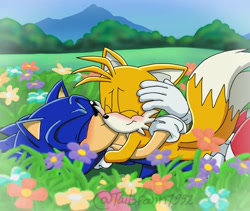 Size: 900x760 | Tagged: safe, artist:tailsfann1992, miles "tails" prower, sonic the hedgehog, 2023, abstract background, blushing, daytime, duo, eyes closed, flower, gay, grass, holding each other, kiss on cheek, lying down, lying on them, outdoors, shipping, signature, sonic x style, sonic x tails