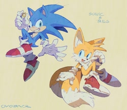 Size: 1200x1038 | Tagged: safe, artist:ovodack, miles "tails" prower, sonic the hedgehog, sonic the hedgehog 2 (2022), character name, duo, duo male, english text, holding something, looking at viewer, male, males only, mid-air, ring, simple background, smile, yellow background