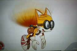 Size: 1600x1055 | Tagged: safe, artist:tailszombiekilla153, miles "tails" prower, 2014, bag, flying, goggles, grey background, looking ahead, male, mouth open, simple background, smile, solo, solo male, sonic boom (tv), spinning tails, traditional media, wrench