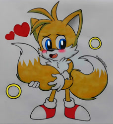 Size: 1024x1124 | Tagged: safe, artist:rwgn, miles "tails" prower, 2019, chest fluff, cute, grey background, heart, holding tail, looking offscreen, mouth open, ring, signature, simple background, smile, solo, standing, tailabetes, traditional media