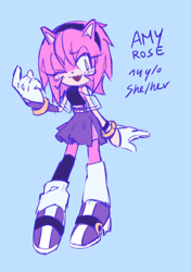 Size: 1600x2272 | Tagged: safe, artist:12neonlit-stage, amy rose, hedgehog, alternate universe, au:crystallized, blue background, blushing, english text, female, looking offscreen, one fang, pronouns, simple background, skirt, smile, solo, standing, wink