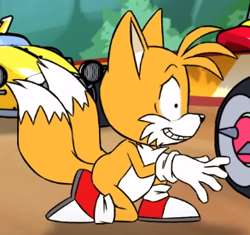 Size: 293x276 | Tagged: safe, miles "tails" prower, faic, great moments in animation, implied knuckles, kneeling, pain, screenshot, shrunken pupils, solo, team sonic racing overdrive