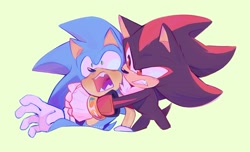 Size: 2048x1248 | Tagged: safe, artist:dumbkami_2, shadow the hedgehog, sonic the hedgehog, hedgehog, 2023, clenched teeth, duo, gay, green background, holding them, looking at them, male, males only, mouth open, redraw, shadow x sonic, shipping, simple background, standing
