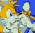 Size: 960x900 | Tagged: safe, artist:tailsfann1992, miles "tails" prower, sonic the hedgehog, fox, hedgehog, 2024, arm around shoulders, blushing, cute, duo, gay, grey background, heart hands, male, shipping, signature, simple background, smile, sonic x tails, standing, wink