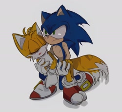Size: 2048x1883 | Tagged: safe, artist:tamjeong_sonic, miles "tails" prower, sonic the hedgehog, 2024, angry, carrying them, duo, eyes closed, frown, gay, grey background, injured, looking offscreen, mouth open, scratch (injury), shipping, simple background, sonic x tails, standing