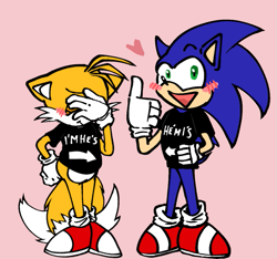 Size: 757x709 | Tagged: safe, artist:elliot7779, miles "tails" prower, sonic the hedgehog, 2024, blushing, clothes, duo, facepalm, frown, gay, heart, looking at viewer, mouth open, pink background, shipping, shirt, simple background, smile, sonic x tails, standing, thumbs up, words on a shirt