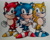 Size: 2780x2248 | Tagged: safe, artist:anxiousalex2004, sonic the hedgehog, 2023, brothers, classic sonic, classic sonic (universe), looking at viewer, segasonic bros, siblings, smile, standing, traditional media, trio