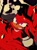 Size: 1505x2047 | Tagged: safe, artist:jiusannn, knuckles the echidna, 2025, clenched fists, clenched teeth, punching, red background, rock, simple background, smile, solo