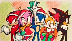 Size: 2048x1161 | Tagged: safe, artist:luigitimepdv, amy rose, knuckles the echidna, miles "tails" prower, sonic the hedgehog, 2025, alternate outfit, arm around shoulders, arms folded, christmas, christmas hat, christmas outfit, clenched fist, clothes, cute, frown, group, hat, mouth open, open smile, present, scarf, side hug, smile, smiling at viewer, standing, v sign, waving, wink, winking at viewer