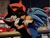 Size: 1024x768 | Tagged: safe, artist:sa_el_k, shadow the hedgehog, sonic the hedgehog, hedgehog, 2025, bus, city, duo, eyes closed, gay, holding each other, kiss, making out, male, nighttime, outdoors, photographic background, shadow x sonic, shipping, signature, standing