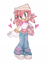 Size: 1551x2048 | Tagged: safe, artist:zoruniii, amy rose, 2025, amybetes, bag, beanie, belt, blushing, charm, clothes, crop top, cute, hair pin, handbag, hat, heart, jeans, looking at viewer, mouth open, smile, solo, standing