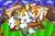 Size: 920x600 | Tagged: safe, artist:malachimoet, cream the rabbit, miles "tails" prower, green hill zone, 2024, abstract background, blushing, clouds, cute, daytime, duo, flower, frown, grass, hugging, hugging from behind, kneeling, lidded eyes, looking at them, looking offscreen, loop, mountain, outdoors, shipping, shrunken pupils, sitting, smile, straight, sunflower, taiream, treads