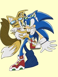 Size: 1536x2048 | Tagged: safe, artist:redsoda_10, miles "tails" prower, sonic the hedgehog, 2025, duo, gay, holding them, looking at each other, riders outfit, riders style, shipping, simple background, smile, smiling at each other, sonic x tails, standing, wink, yellow background