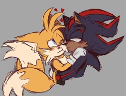 Size: 600x456 | Tagged: safe, artist:buttersss__, miles "tails" prower, shadow the hedgehog, 2025, age difference, blushing, cheek fluff, duo, gay, grey background, heart, hugging, kiss, kiss on cheek, looking at them, shadow x tails, shipping, simple background, smile