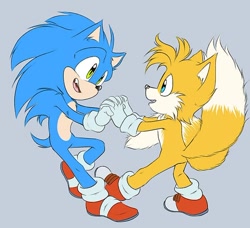 Size: 600x547 | Tagged: safe, artist:lebluenooki, artist:marty_jade23, miles "tails" prower, sonic the hedgehog, sonic the hedgehog 2 (2022), 2023, duo, flat colors, grey background, holding hands, looking at each other, mouth open, one fang, simple background, smile, smiling at each other, standing