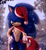 Size: 1397x1513 | Tagged: safe, artist:shadisfaction, sonic the hedgehog, hedgehog, 2017, cape, christmas, christmas hat, christmas outfit, daytime, hand on hip, hat, holding something, lidded eyes, lineless, looking at viewer, male, outdoors, sack, signature, smile, smiling at viewer, snow, solo, standing, tree, watermark, winter