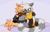 Size: 1566x998 | Tagged: safe, artist:lawyerdog, tangle the lemur, whisper the wolf, lemur, wolf, 2022, cheek to cheek, duo, female, flat colors, grey background, holding tail, kneeling, lesbian, shipping, simple background, sitting, smile, tangabetes, tangle x whisper, wagging tail, whispabetes