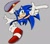 Size: 809x719 | Tagged: safe, artist:myllo24, sonic the hedgehog, 2026, grey background, looking at viewer, mid-air, pointing, posing, simple background, smile, solo, treads