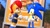 Size: 1920x1080 | Tagged: safe, artist:spikehedgelion8, sally acorn, sonic the hedgehog, chipmunk, hedgehog, 2021, 3d, archie sonic the hedgehog, building, daytime, duo, english text, female, gmod, house, looking at each other, male, sally x sonic, sally's ringblader outfit, shipping, standing, straight, tree, valentine's day