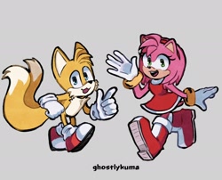 Size: 2048x1658 | Tagged: safe, artist:ghostlykuma, amy rose, miles "tails" prower, 2025, cute, duo, grey background, looking at viewer, mouth open, open smile, pointing, simple background, smile, standing, standing on one leg, treads, walking, waving