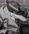 Size: 1707x2048 | Tagged: safe, artist:gamertimeartz, vector the crocodile, crocodile, 2026, 35 days sonic, brick wall, clothes, coat, fedora, greyscale, hat, looking at viewer, male, monochrome, signature, smile, solo, trench coat