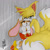 Size: 894x894 | Tagged: safe, artist:nanalabell, cream the rabbit, miles "tails" prower, fox, rabbit, abstract background, cream x tails, duo, female, frown, hand on another's head, holding them, looking at viewer, male, mouth open, protecting, shipping, squinting, straight