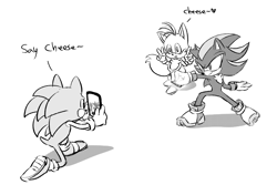Size: 1500x1000 | Tagged: safe, artist:marimo838, miles "tails" prower, shadow the hedgehog, sonic the hedgehog, chaos emerald, double v sign, english text, greyscale, heart, holding something, looking at them, monochrome, phone, pose, shadow the hedgehog (video game), simple background, smile, standing, taking picture, trio, v sign, victory pose, white background